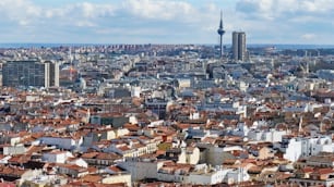 An aerial view of the brown roofs of the skyline of Madrid, Spain