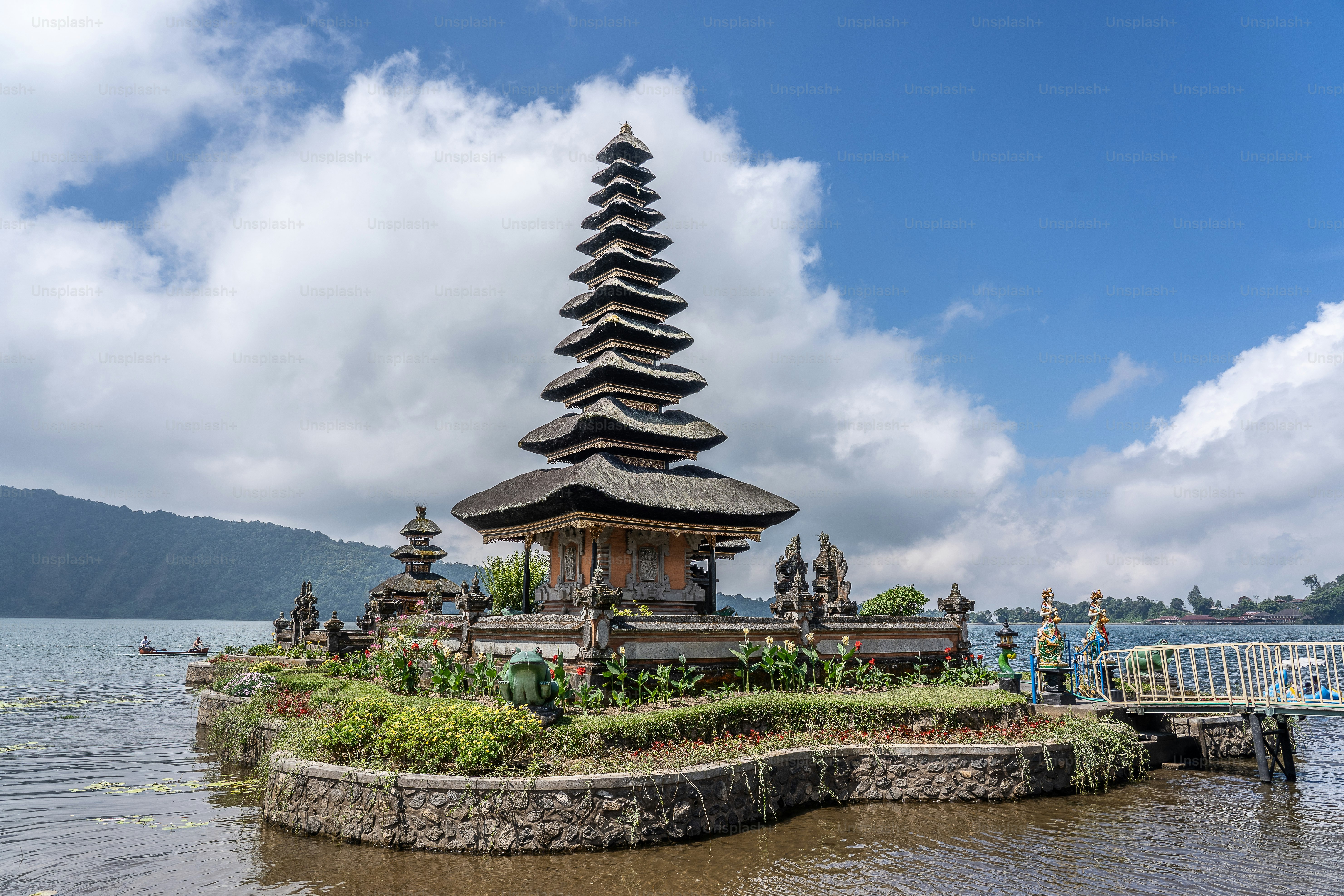 The Pura Ulun Danu Bratan temple in Indonesia with the white clouds in the  background photo – Architecture Image on Unsplash, image size:3000x2000