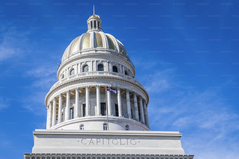 The National Capitol building under a blue sky and sunlight in Havana, Cuba