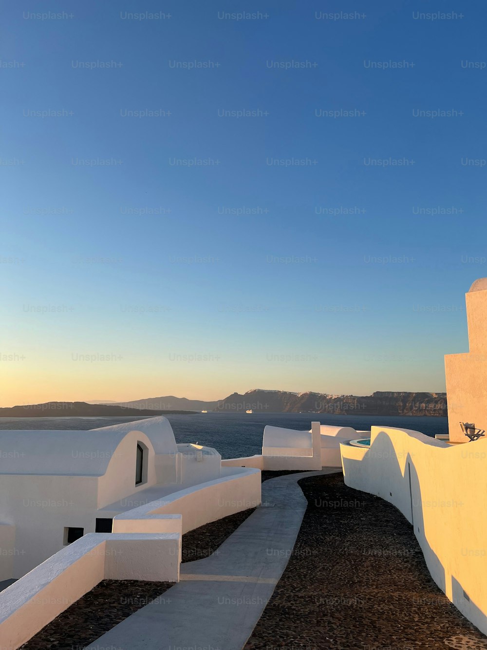 Sunset at a luxury suite in Santorini, Greece