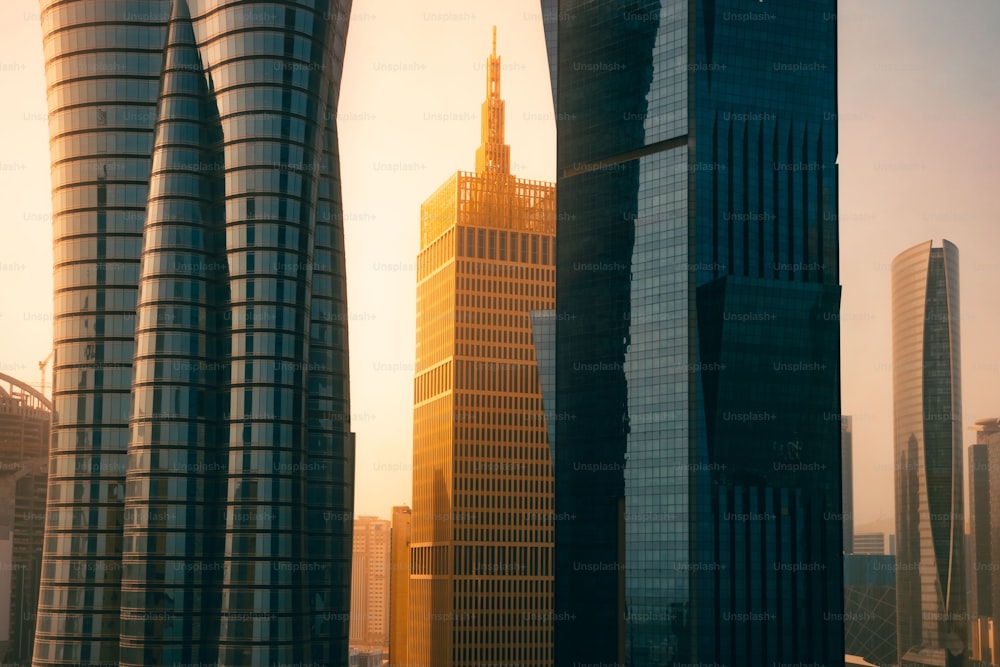 The bright sun shining over a skyscraper in Doha, Qatar