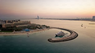 An aerial shot of The Palms islands at sunset in Dubai, United Arab Emirates.