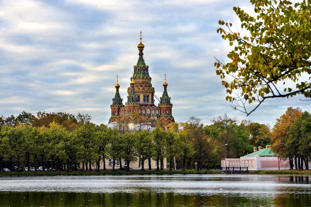 The Cathedral of Peter and Paul in Petergof against a blue cloudy sky