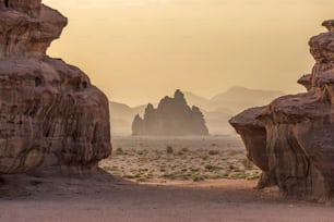 A picturesque desert landscape with rock formations of Tabuk, Neom at sunset