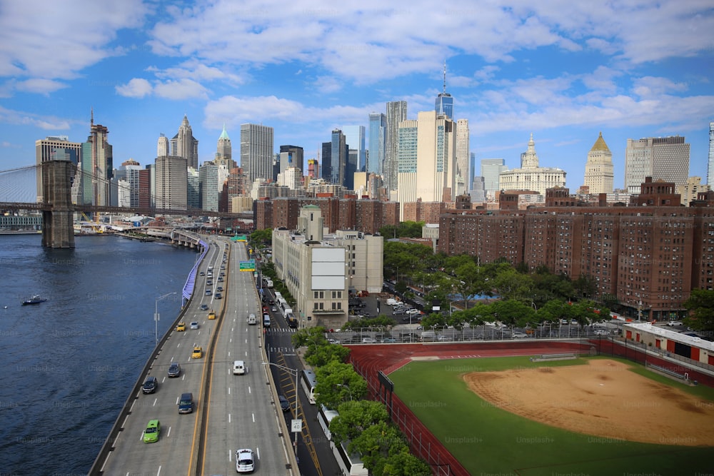 An aerial view of Manhattan Skyline and Brooklyn Bridge from Manhattan Bridge, New York City
