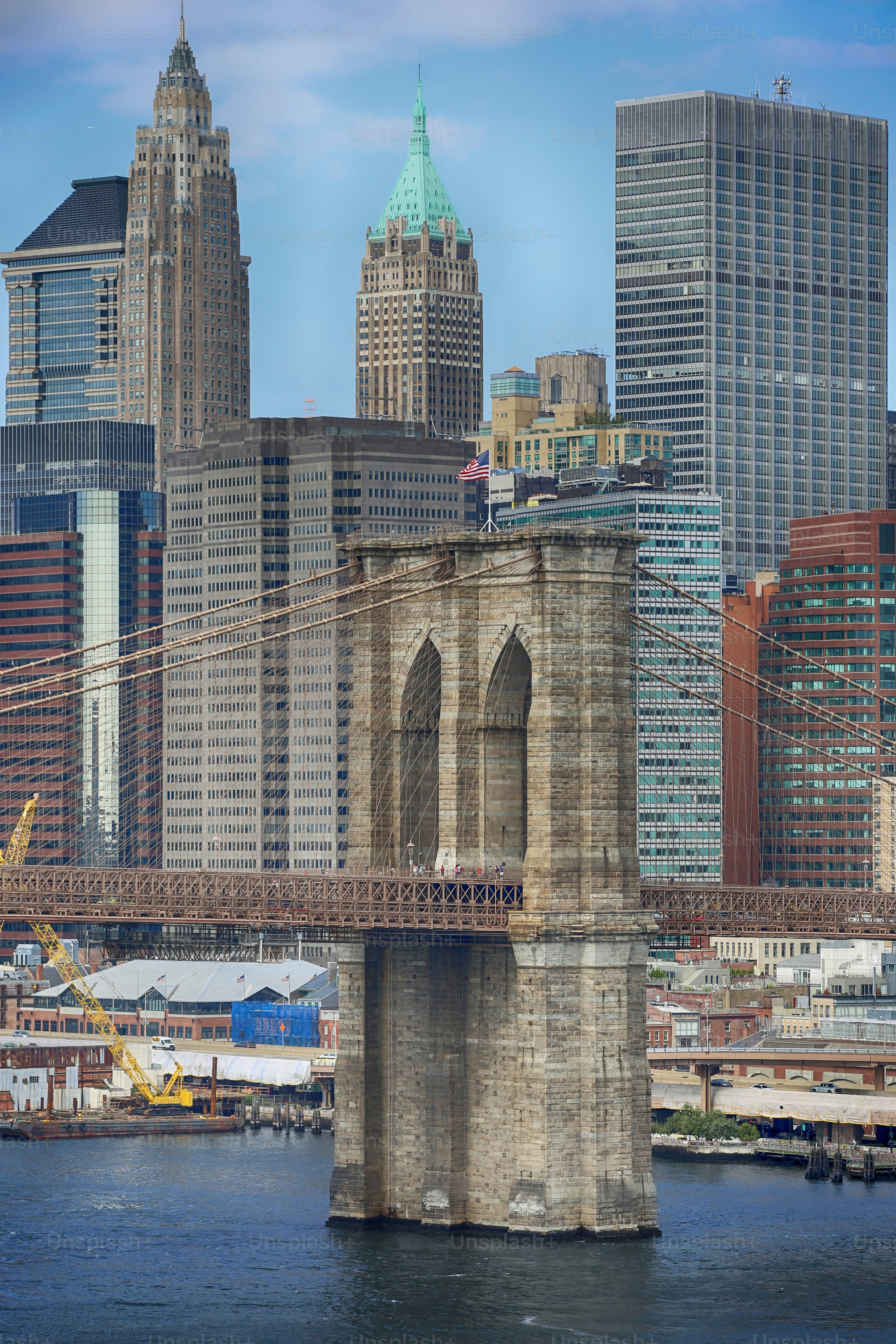 An aerial view of Manhattan Skyline and Brooklyn Bridge from Manhattan Bridge, New York City