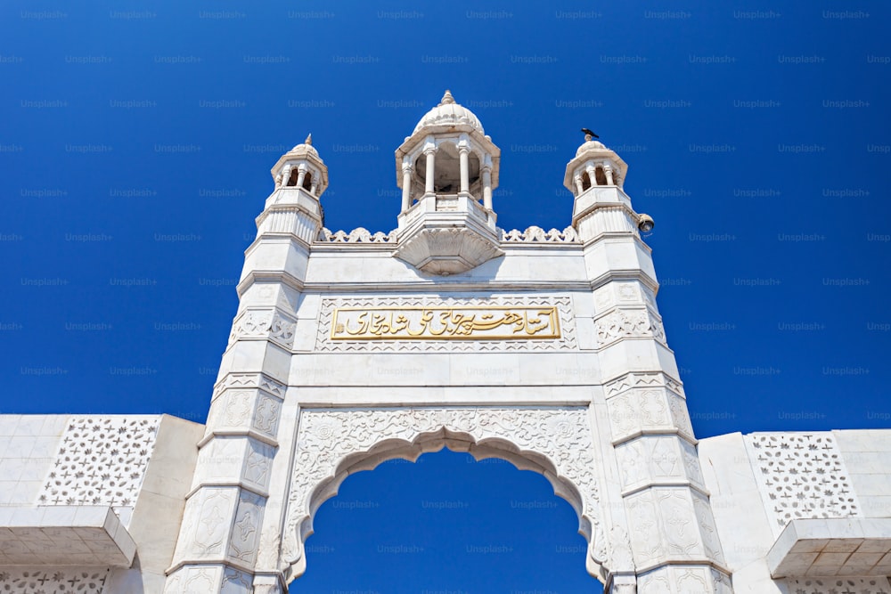 Haji Ali Dargah mosque in Mumbai, India. "Haji Ali Dargah" writing on the building.