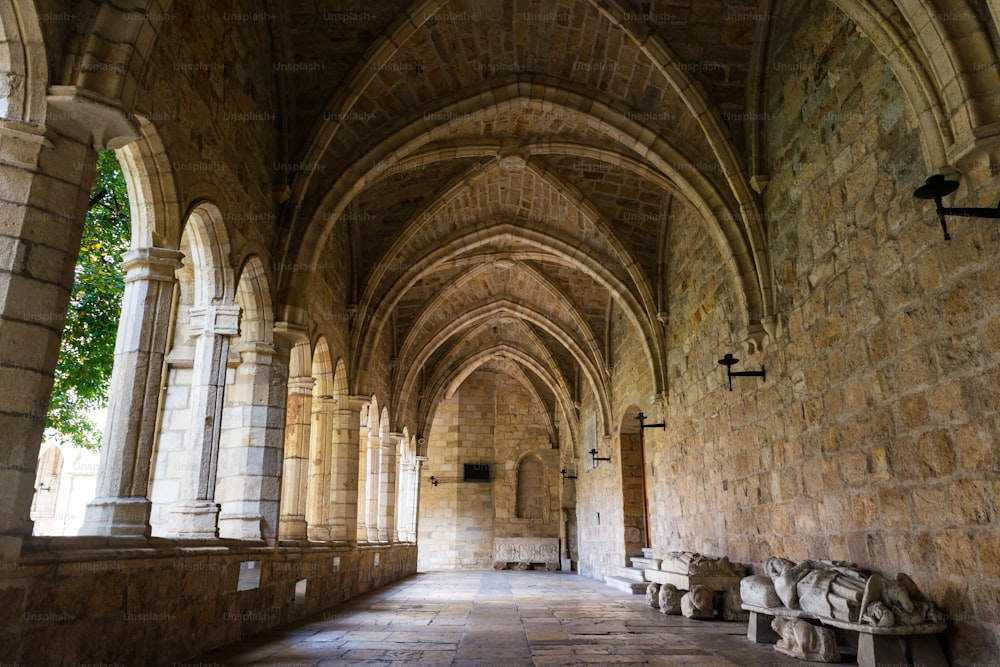 Columns and arches of the cloister of the Cathedral Basilica of Santander (Catedral de Nuestra Señora de la Asunción), Cantabria, built between the 12th century and the 14th century on top of an abbey. Toned.