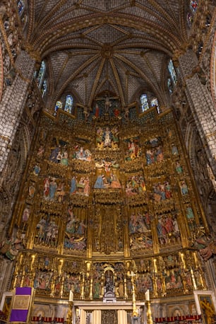 Inside view of the retable and High Altar of the Cathedral of Toledo (Primate Cathedral of Saint Mary of Toledo), an extremely florid Gothic altarpiece and one of the last examples of this artistic style. The cathedral of Toledo is one of the three 13th-century High Gothic cathedrals in Spain and is considered to be the magnum opus of the Gothic style in Spain.