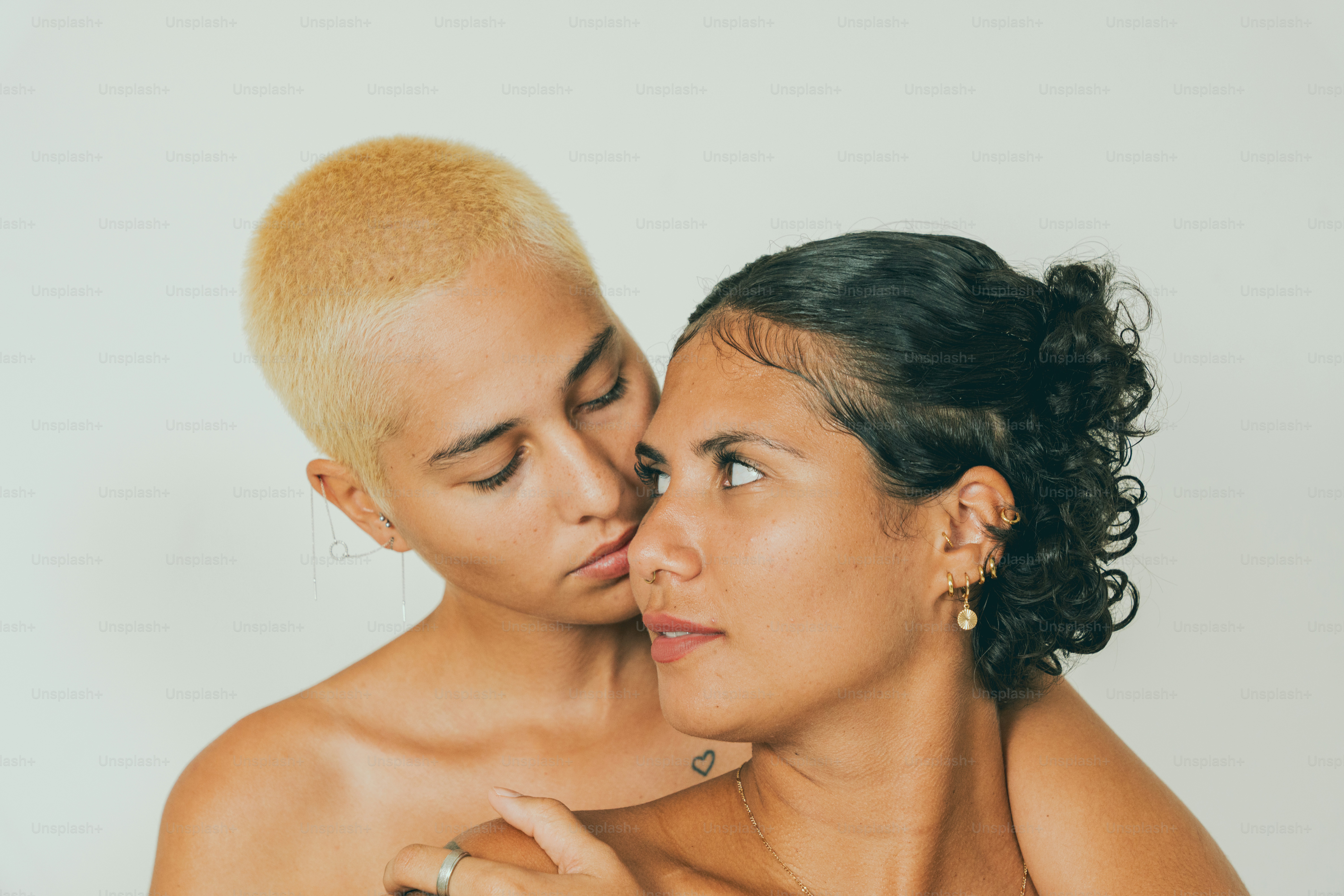 a couple of people that are kissing each other