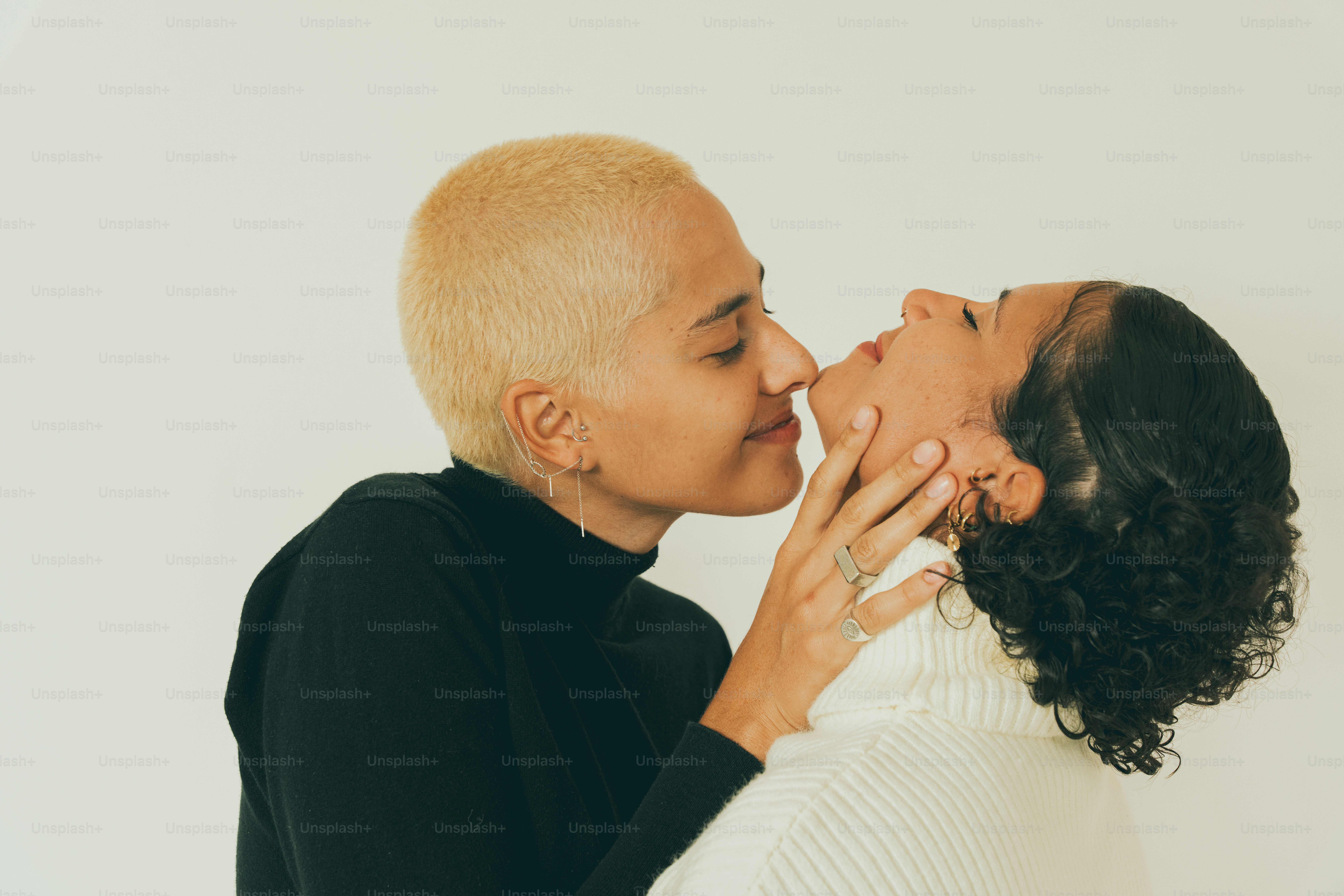 a couple of people that are kissing each other