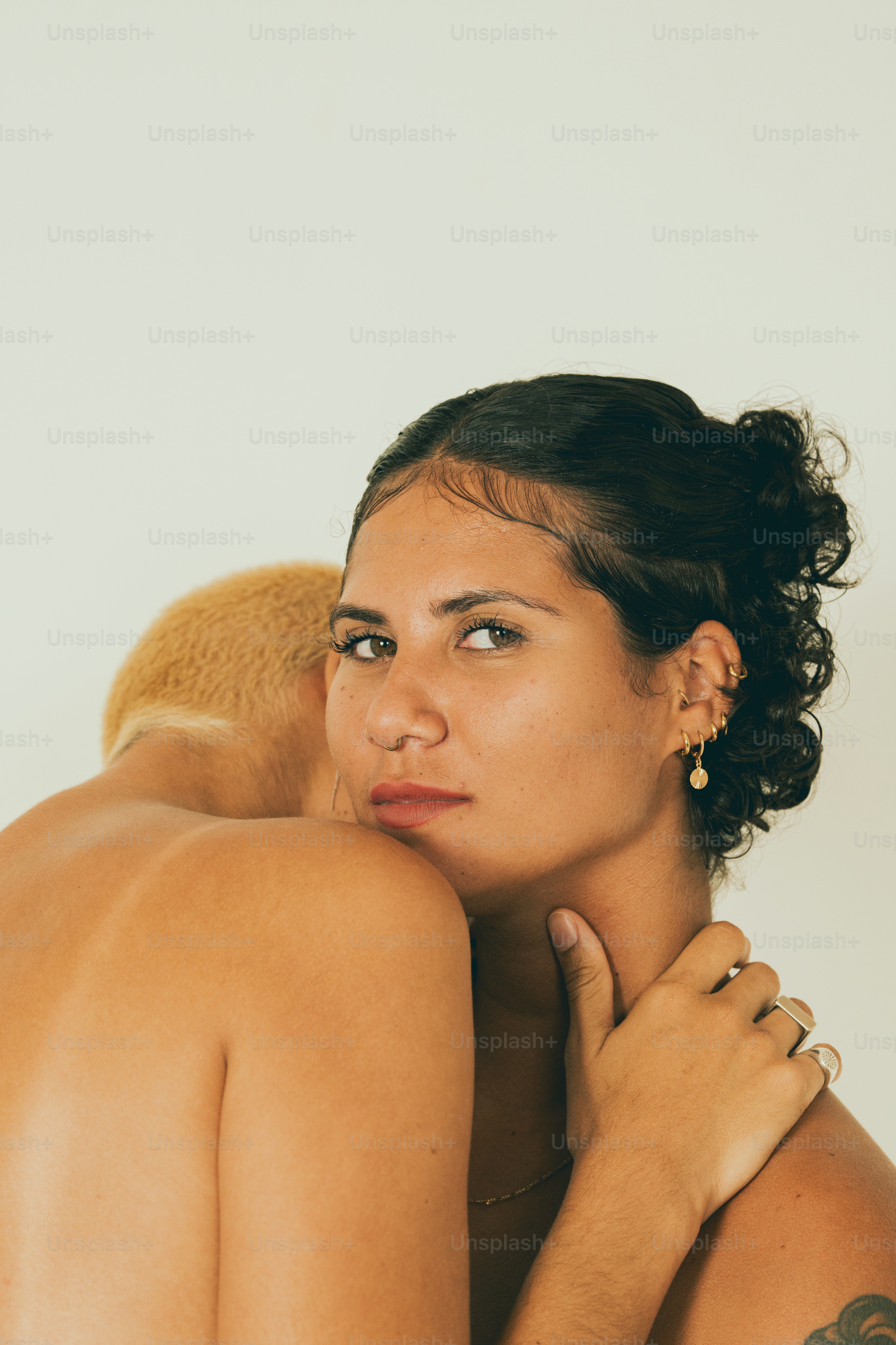 a woman with a tattoo on her arm