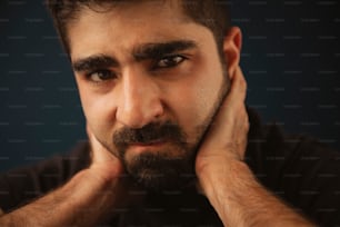 a close up of a man with a beard