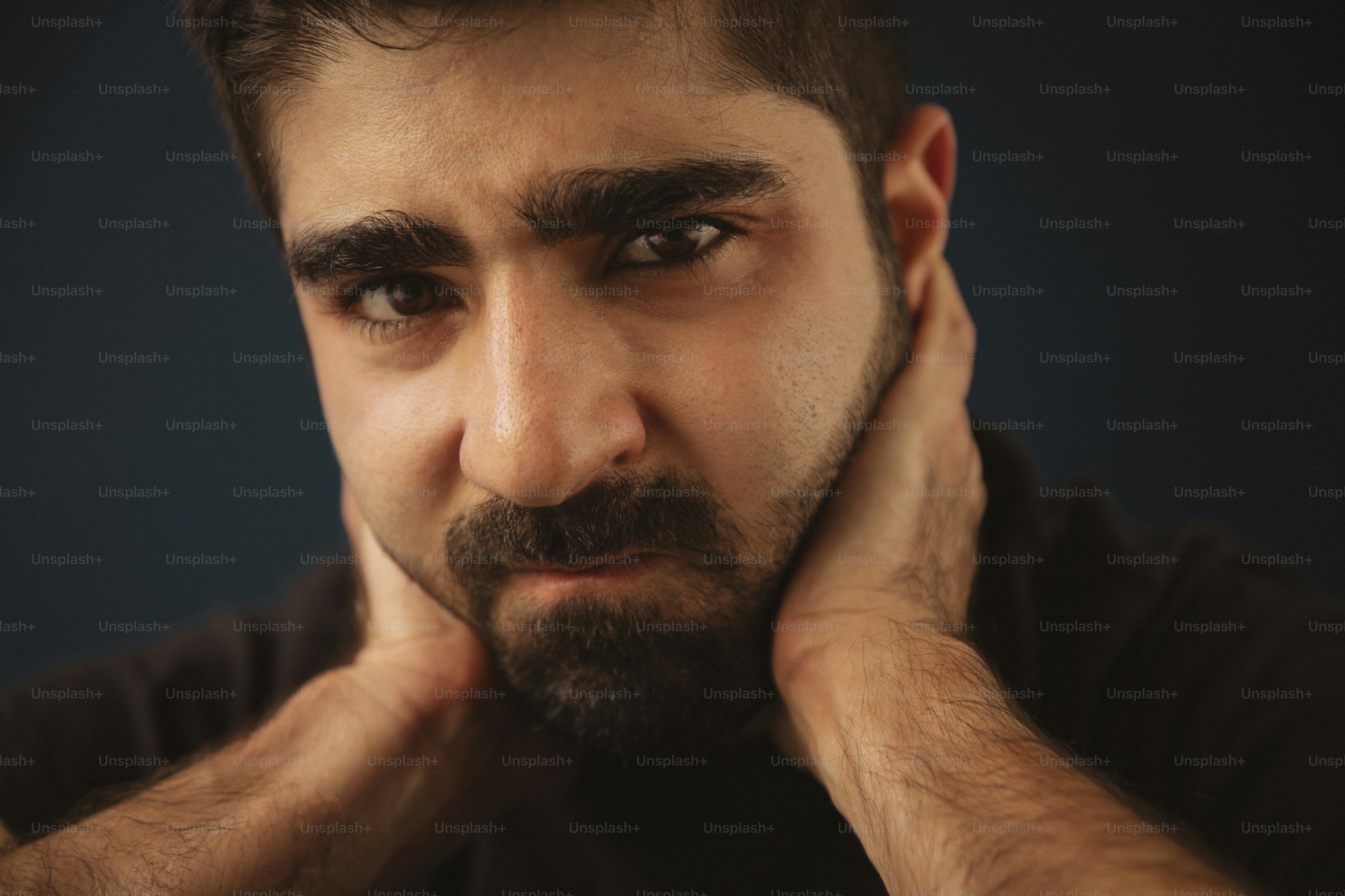 a close up of a man with a beard