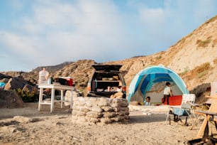 a group of tents set up on the side of a mountain