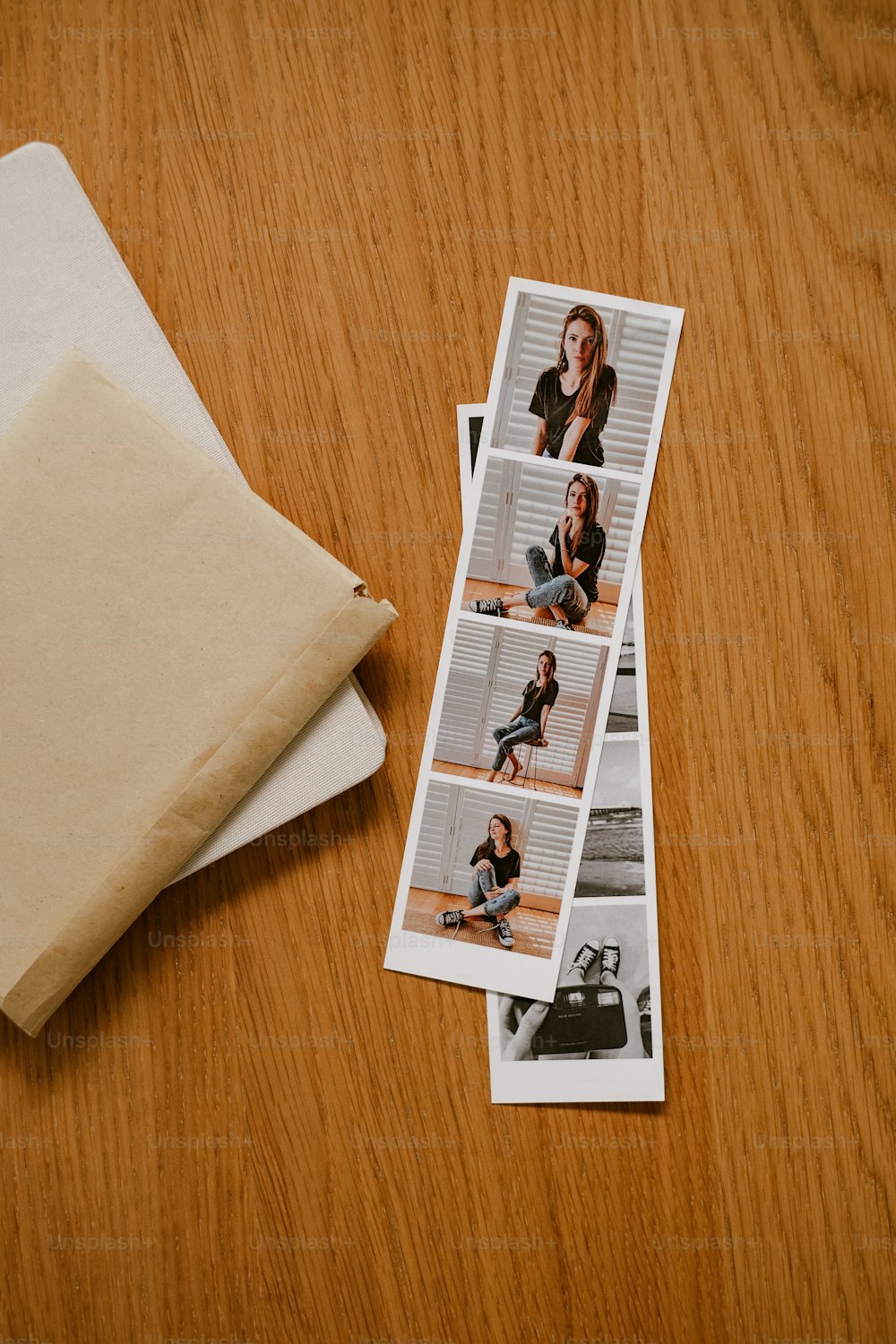 a photo of a woman sitting on a bench next to a pillow