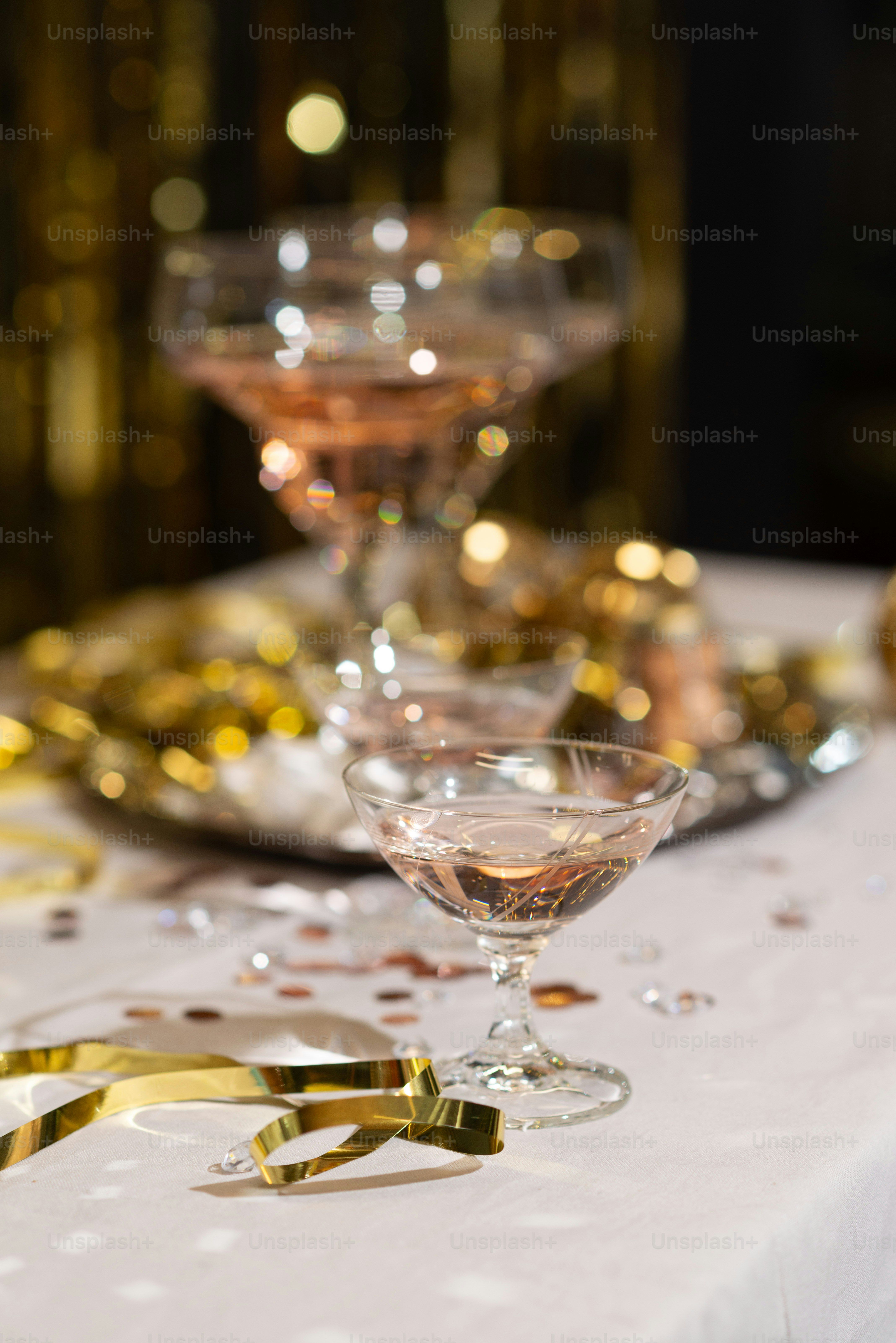 A Table Topped With Glasses Of Champagne And Confetti Photo New Year   Premium Photo 1697978640621 58292d9da86a