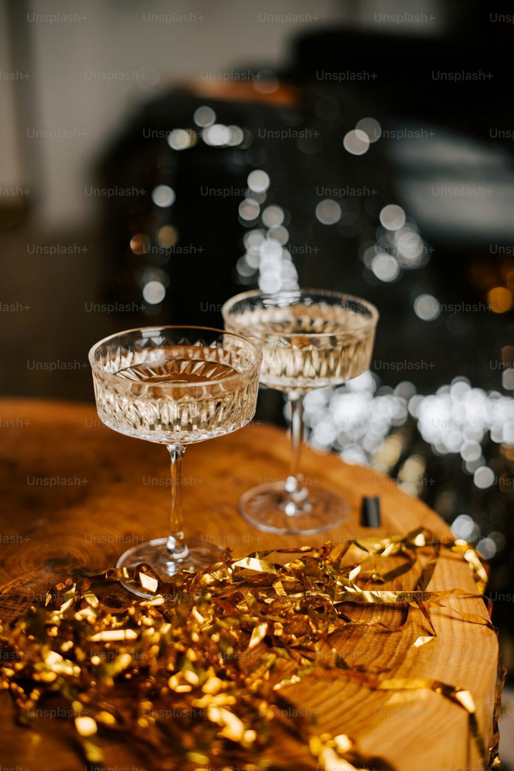 a couple of glasses that are on a table