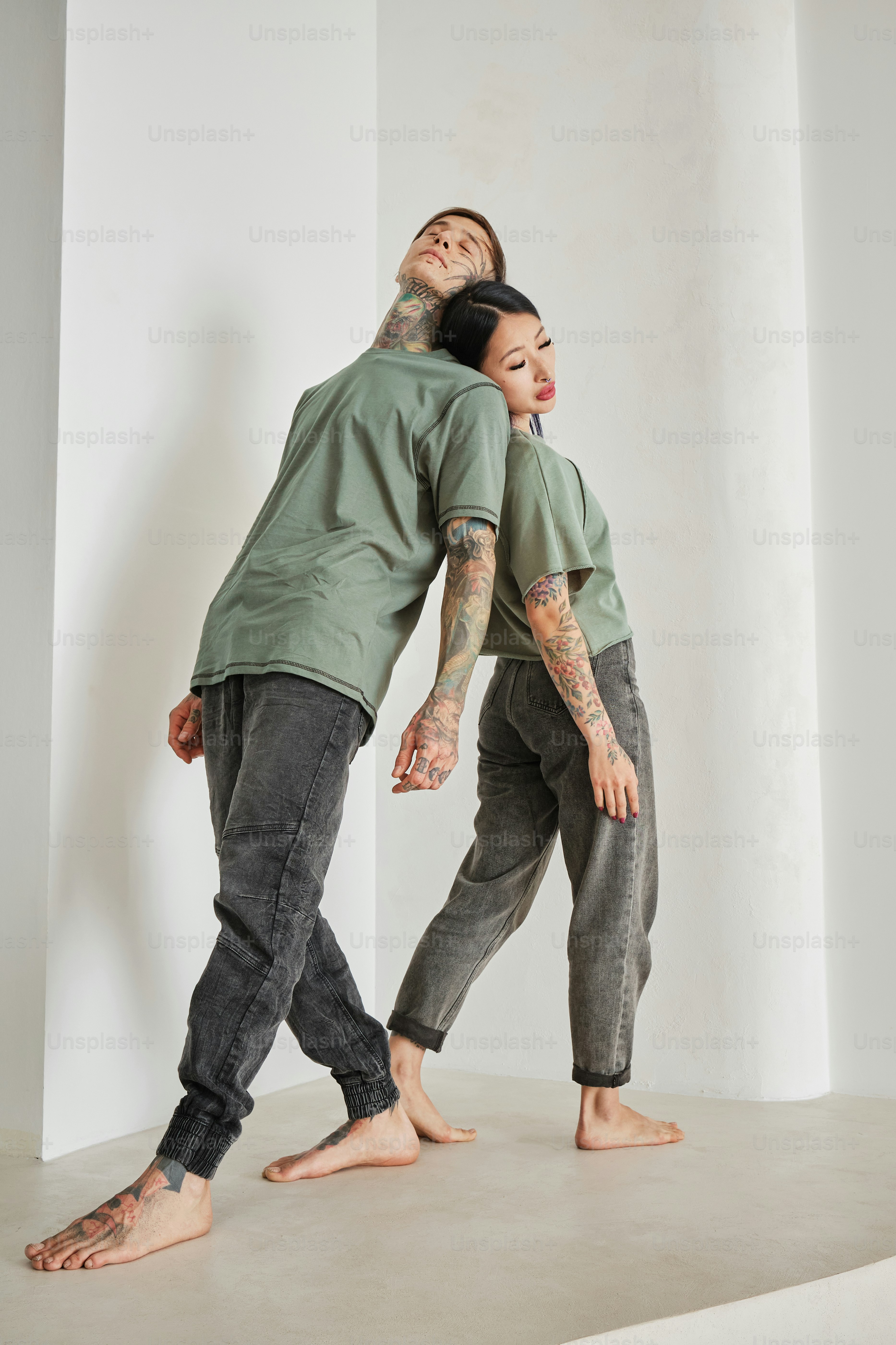 a man and a woman standing next to each other