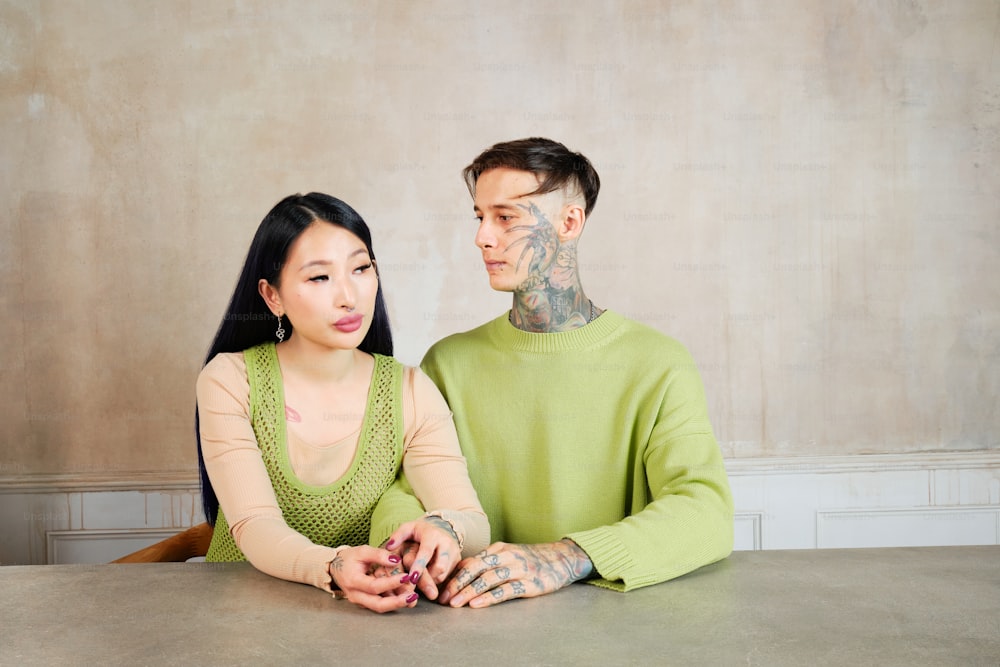 a man and a woman sitting at a table