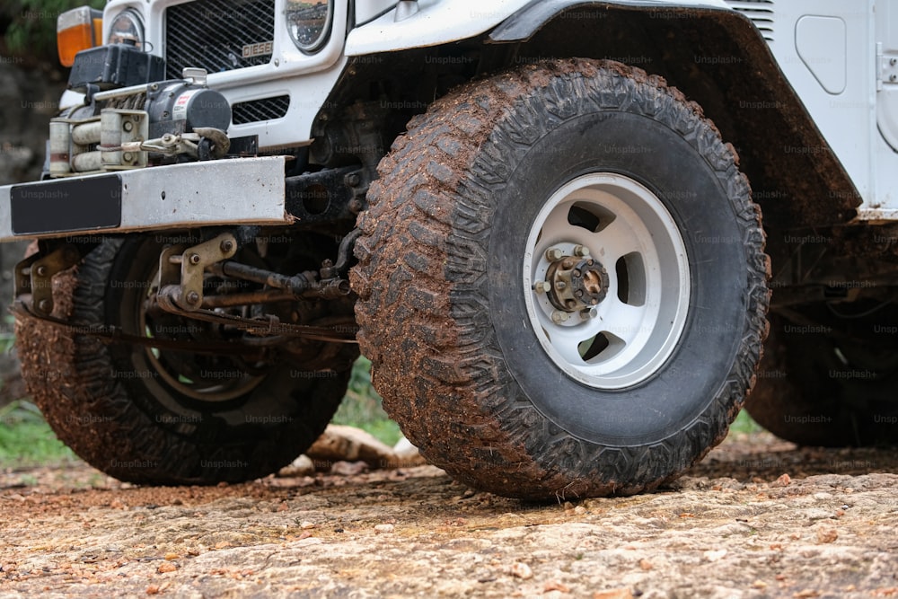 a close up of the front wheels of a jeep
