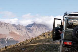 a jeep parked on the side of a mountain