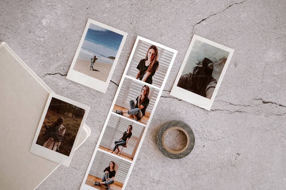 a table topped with pictures and a cup of coffee