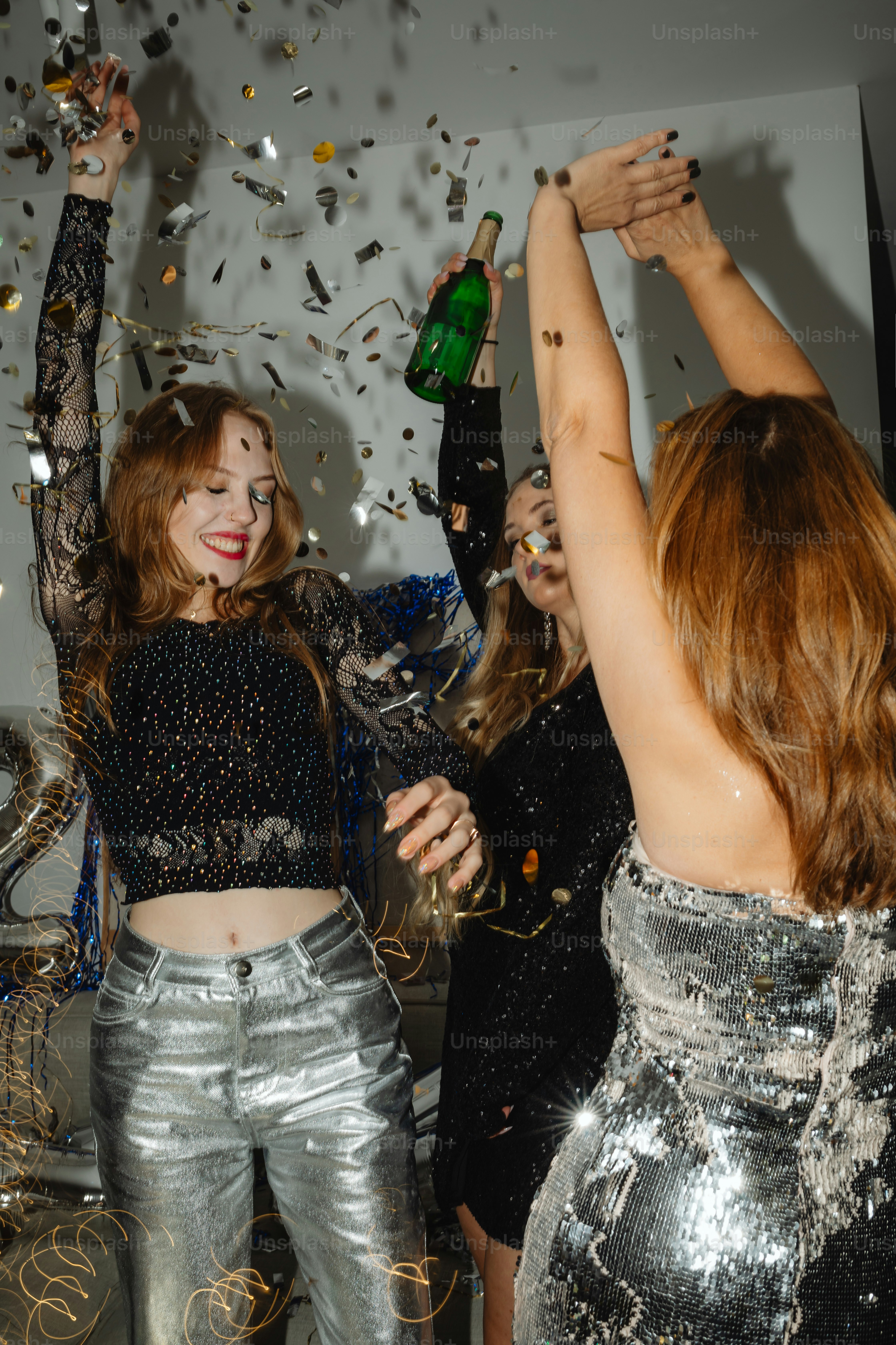 a group of women standing next to each other