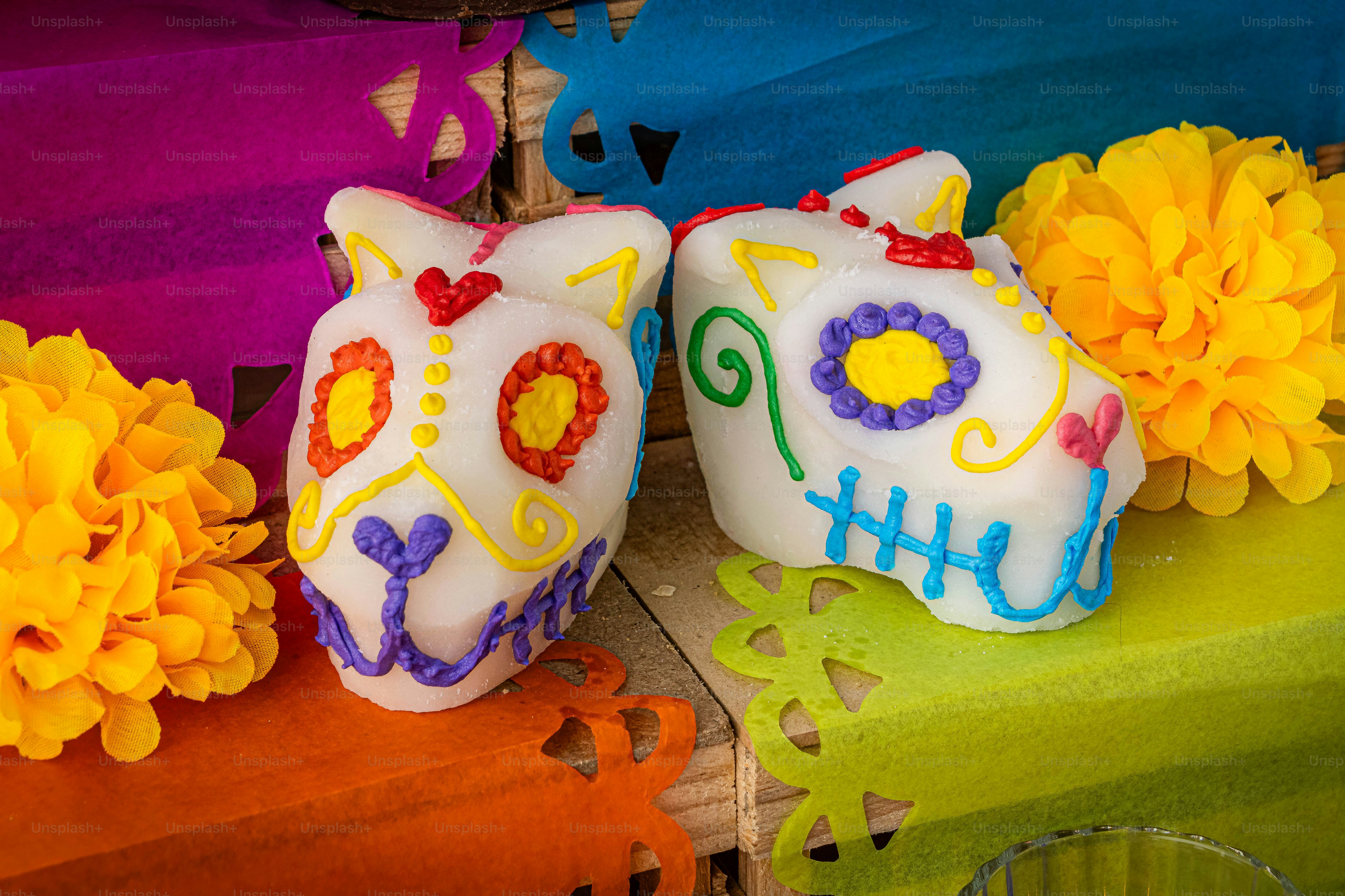a decorated cake with flowers on a table