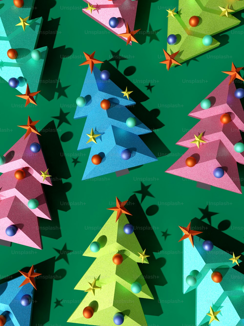 un grupo de coloridos árboles de Navidad sobre un fondo verde