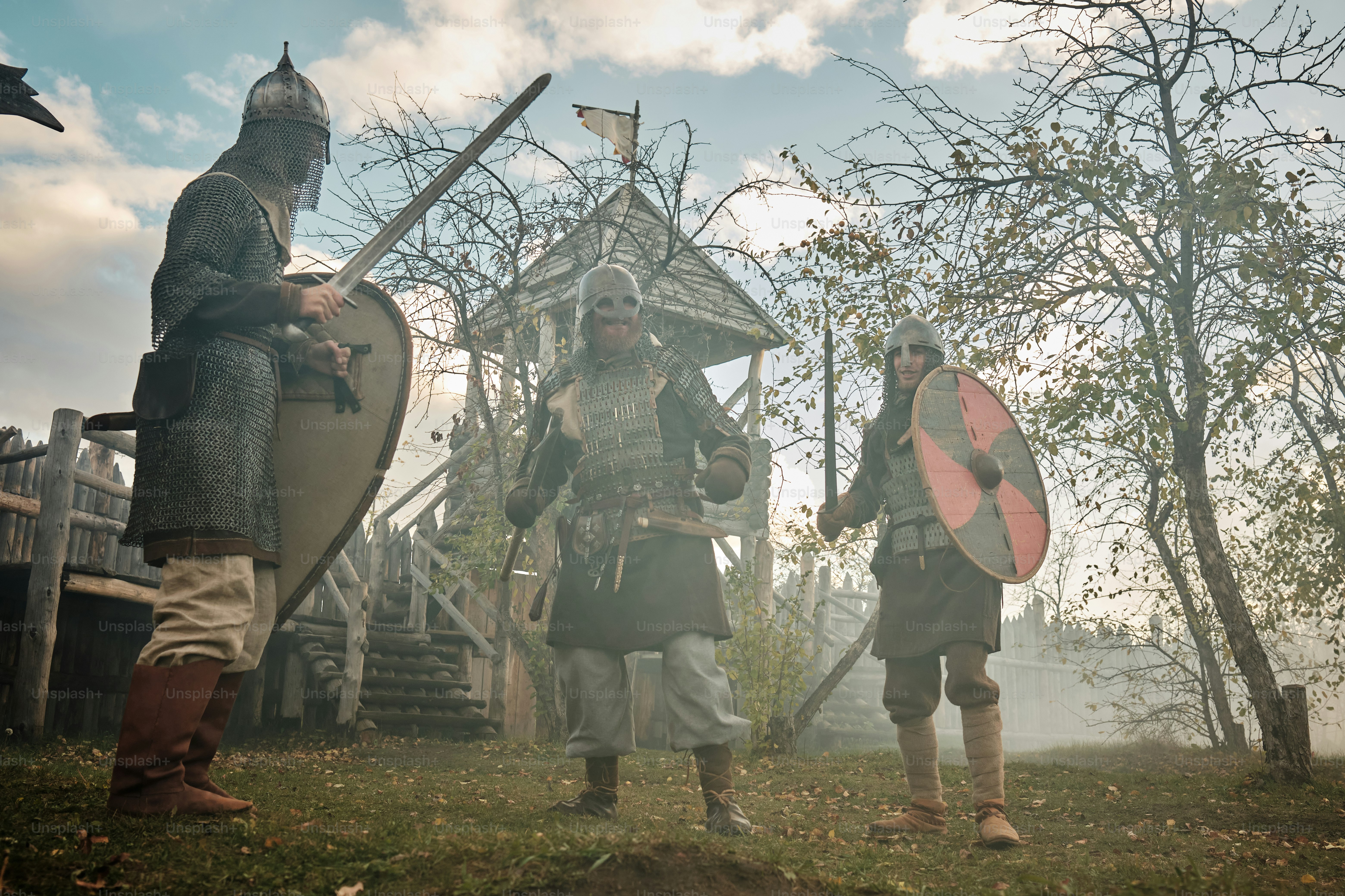 a group of men standing next to each other on a field