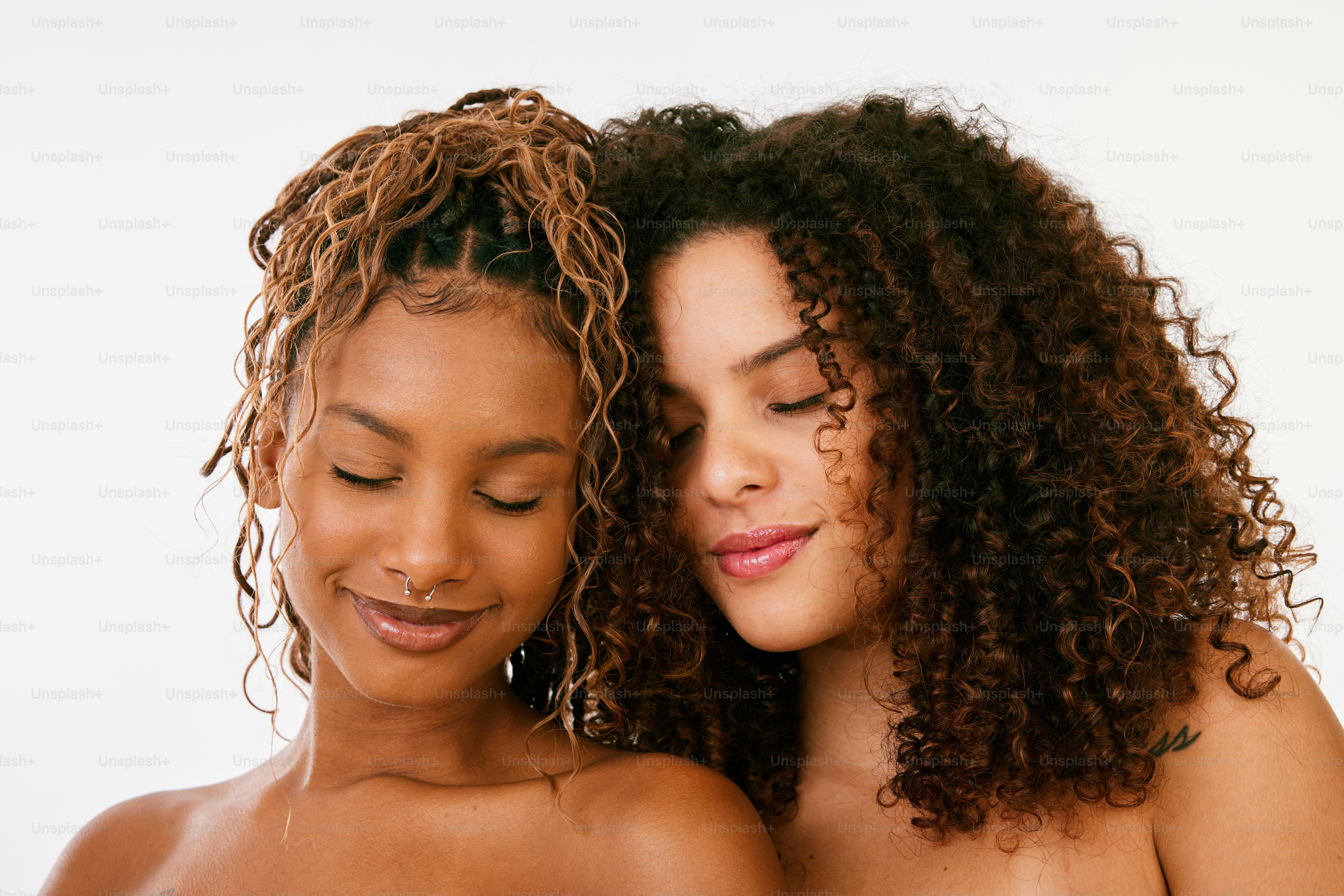 Two beautiful women with curly hair and piercings photo – Love Image on ...