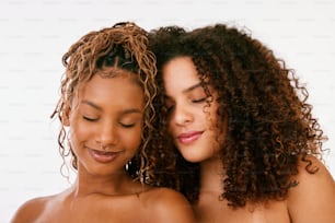 a couple of women standing next to each other