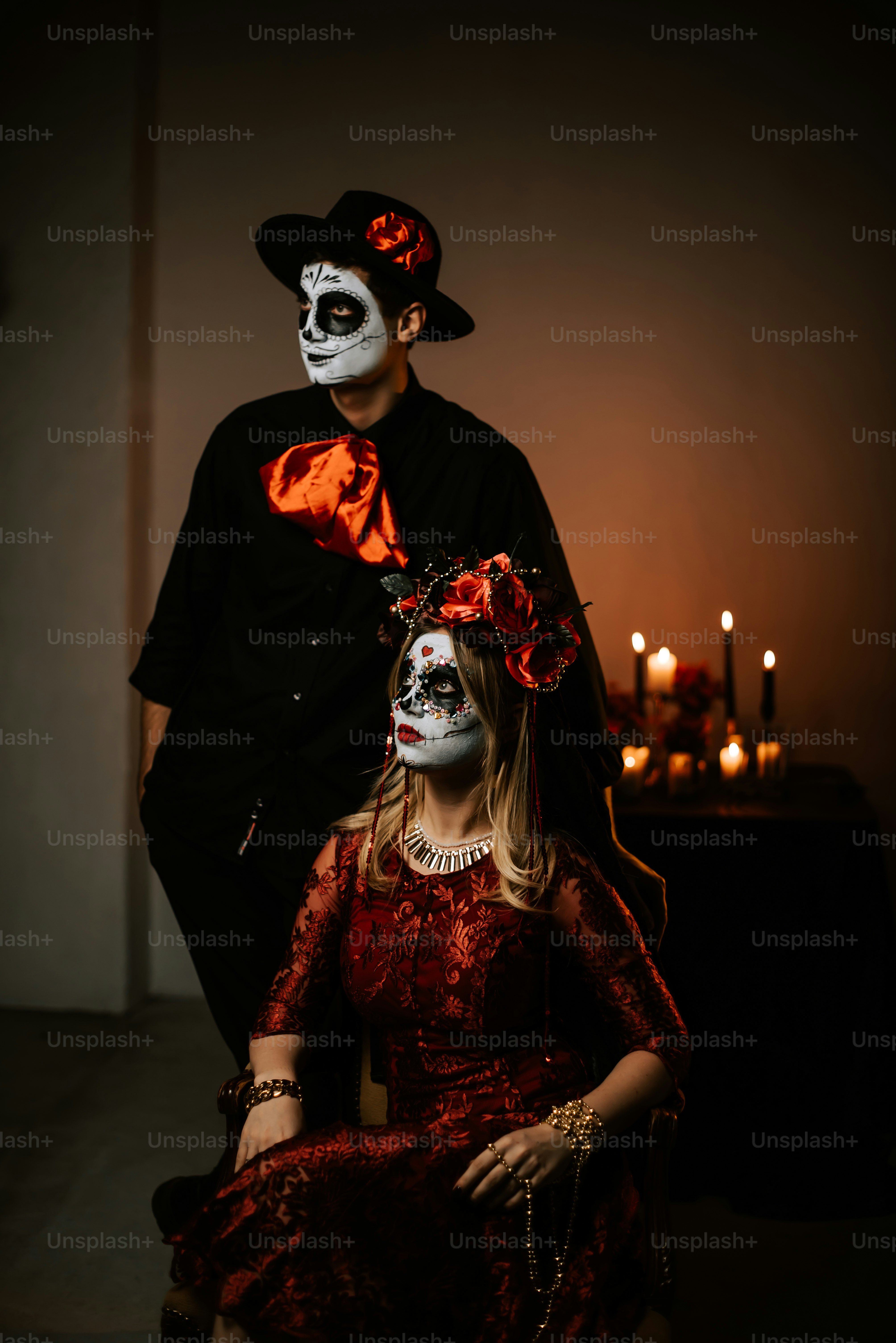 Couple comparing matching costume ideas with accessories for themed party outfits