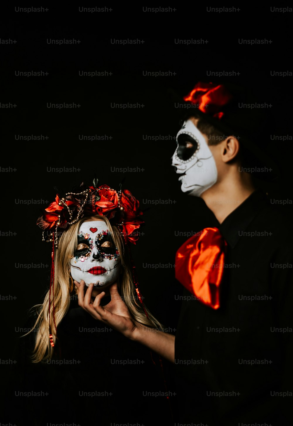 a man and a woman in halloween costumes