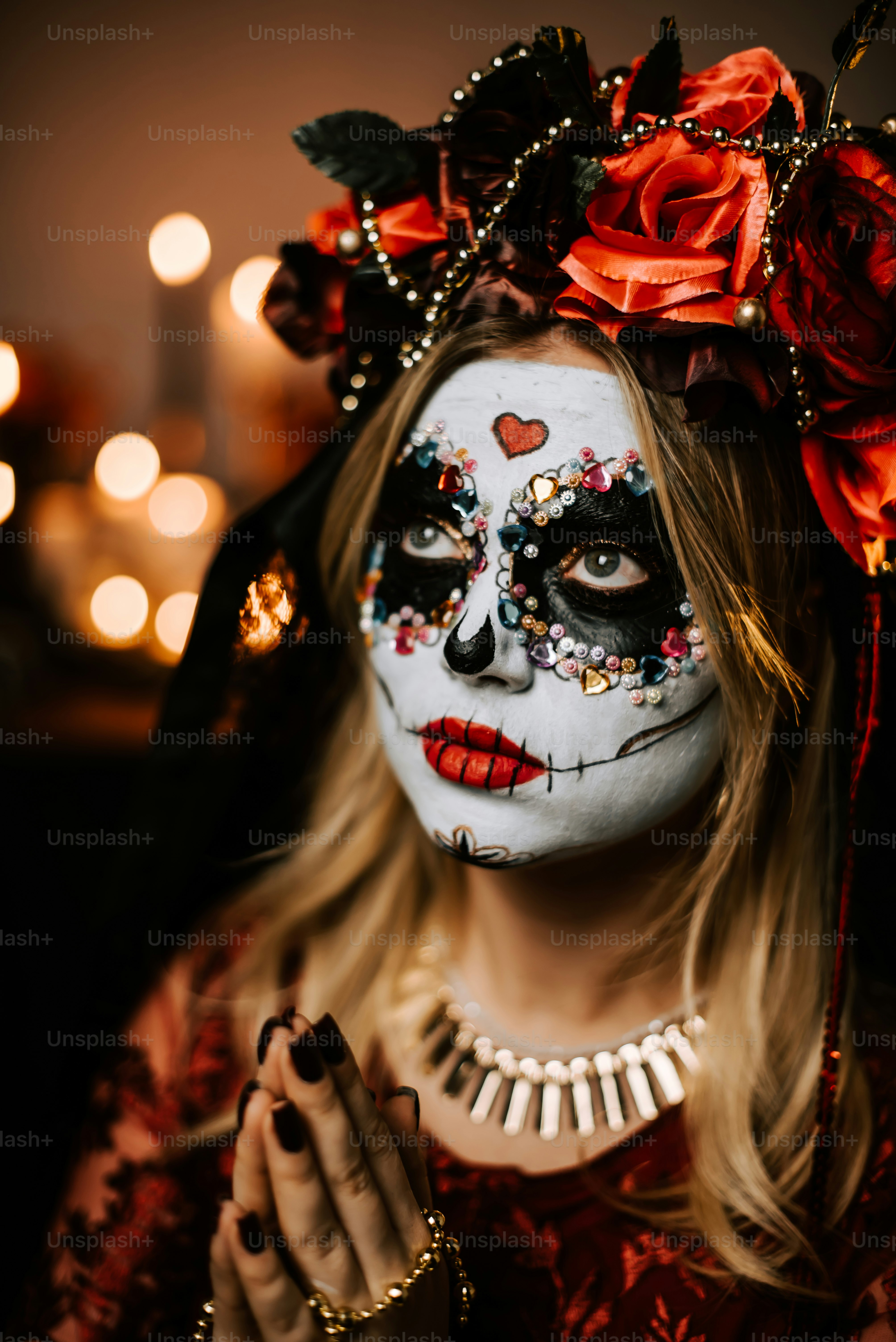 a woman with makeup painted to look like a skeleton