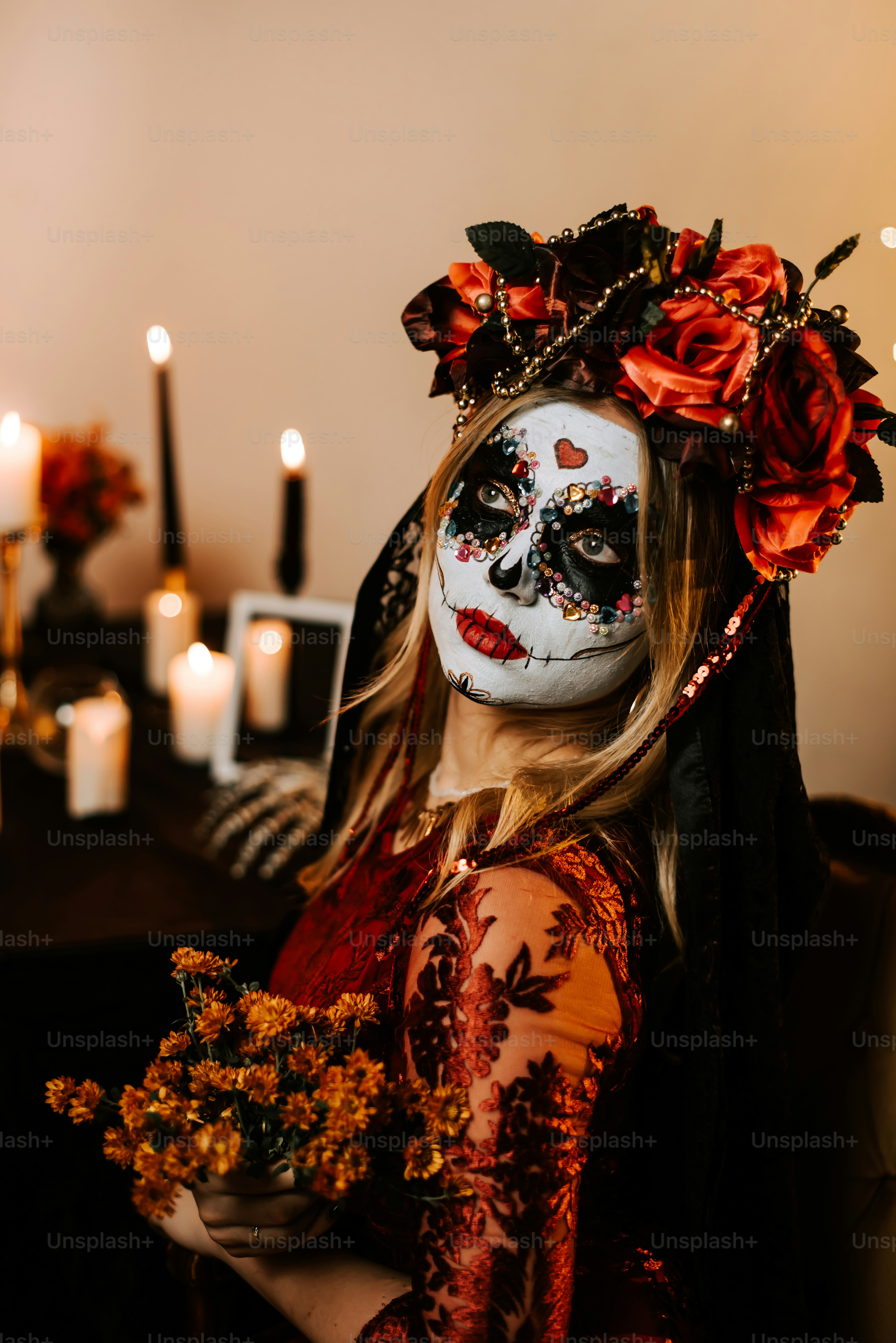 a woman with makeup painted to look like a skeleton