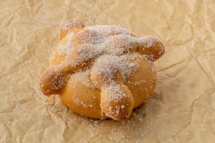 a pastry with powdered sugar on top of it