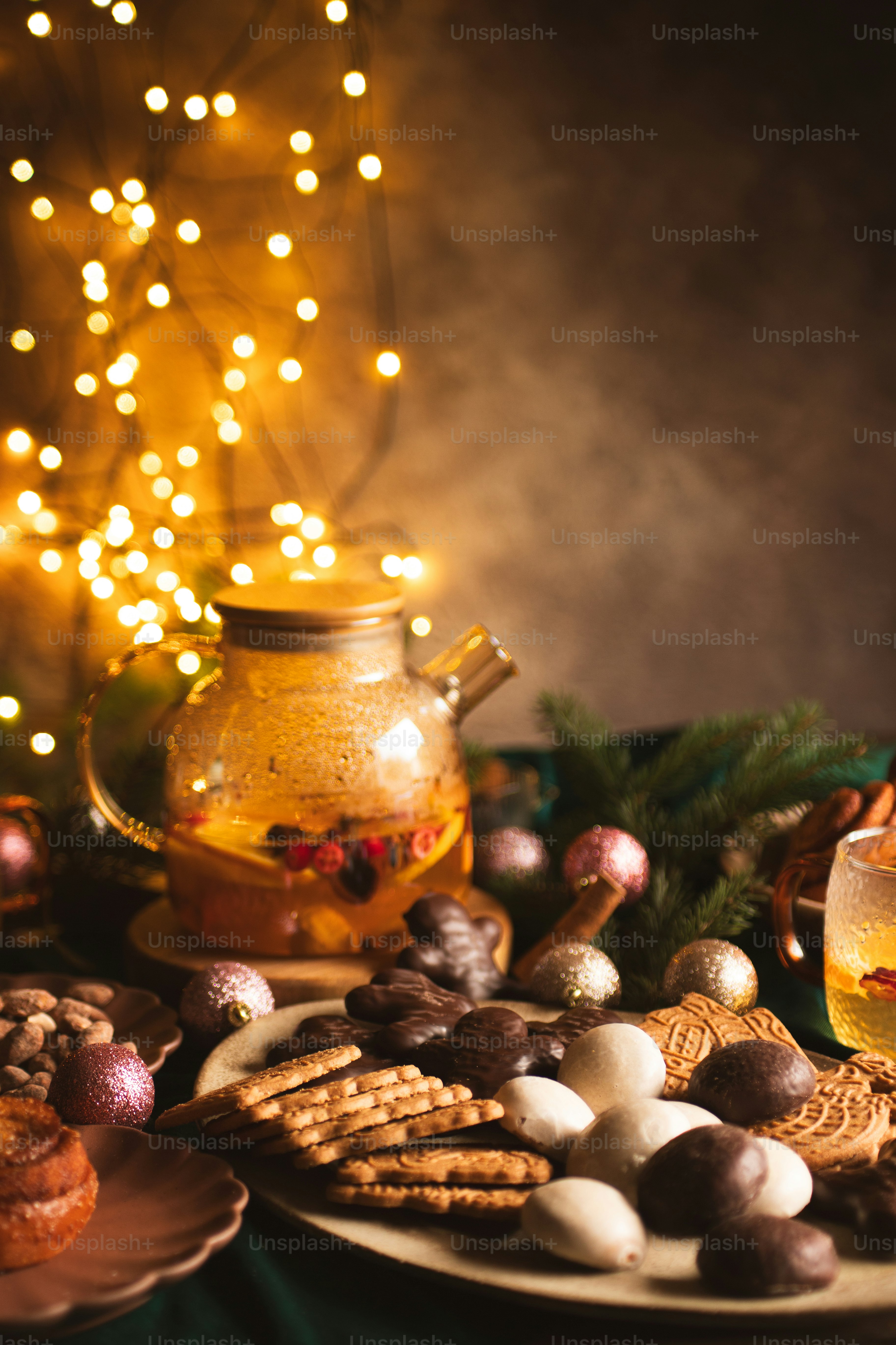 a table topped with a plate of food and a glass of wine