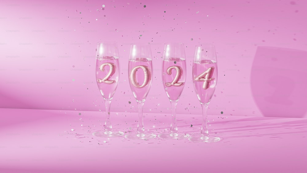 a group of wine glasses with the numbers 2014 in them
