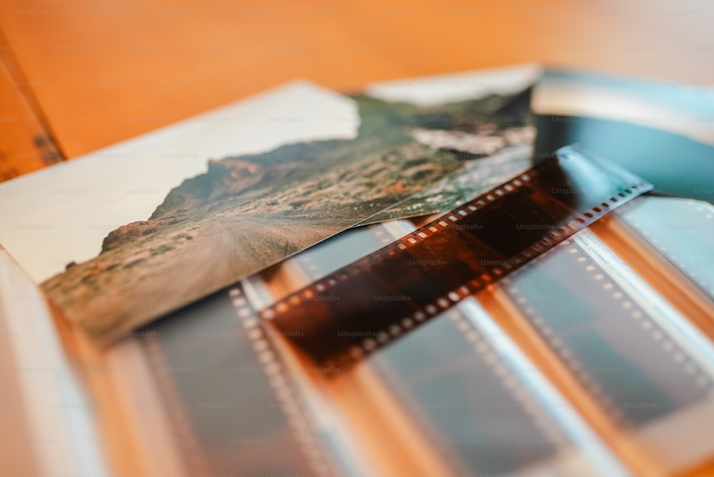 a film strip with a picture of a mountain on it
