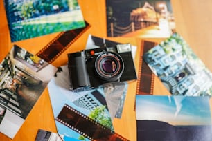 a camera sitting on top of a wooden table