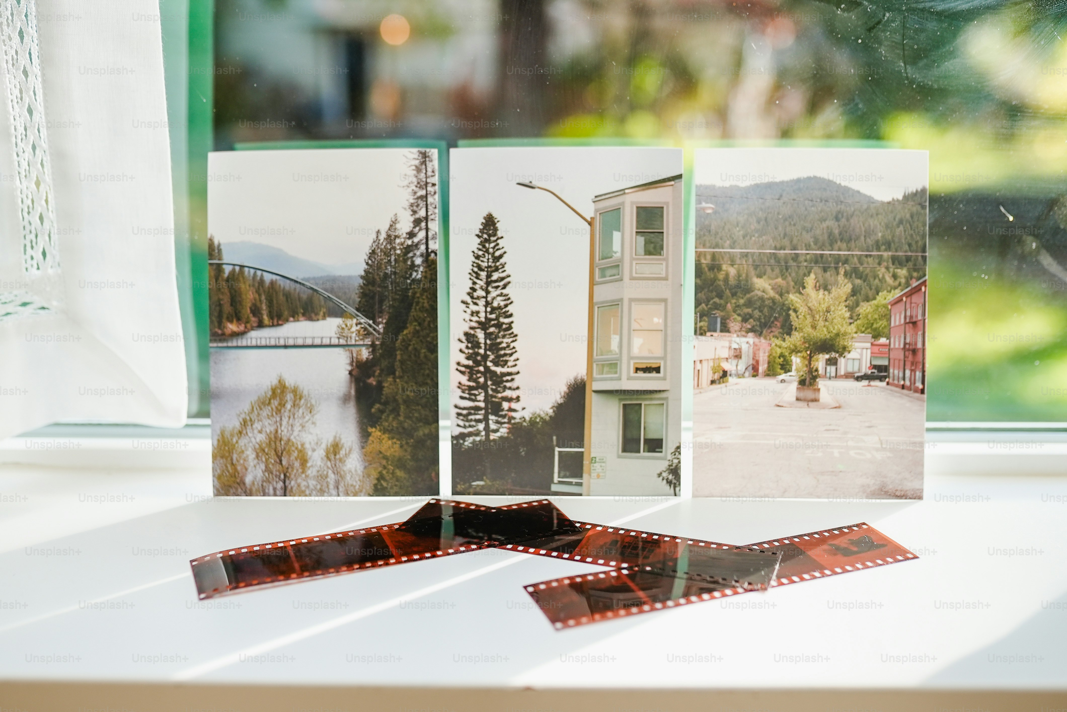 a window sill with some pictures on it