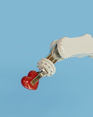 a robot holding a heart in its right hand