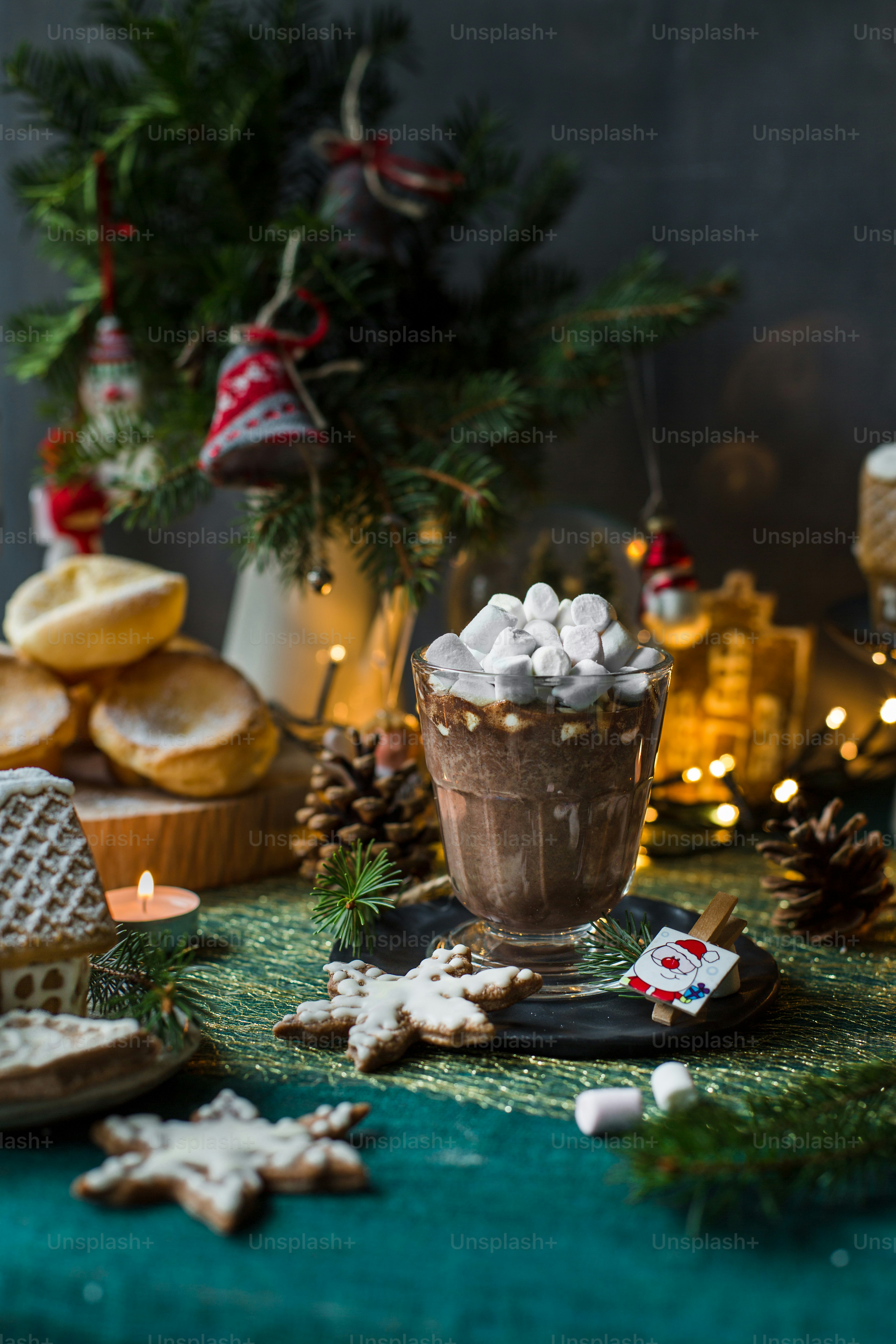 a cup of hot chocolate with marshmallows on a table