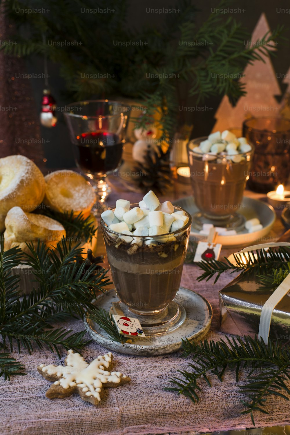a table topped with a cup of hot chocolate