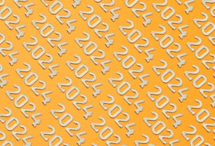 a yellow background with white numbers on it