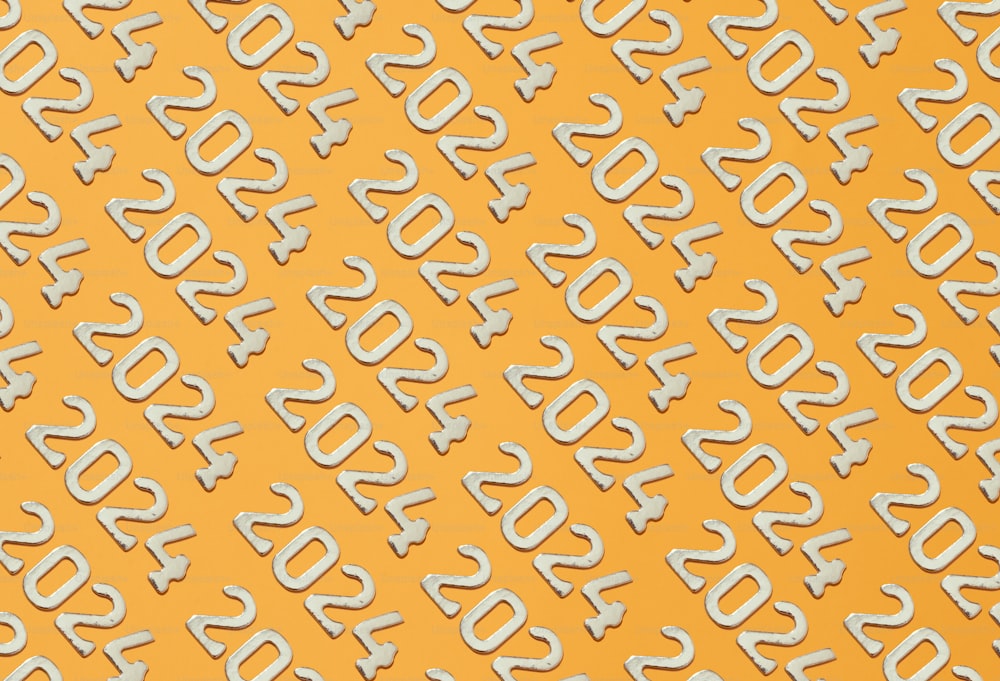 a yellow background with white numbers on it