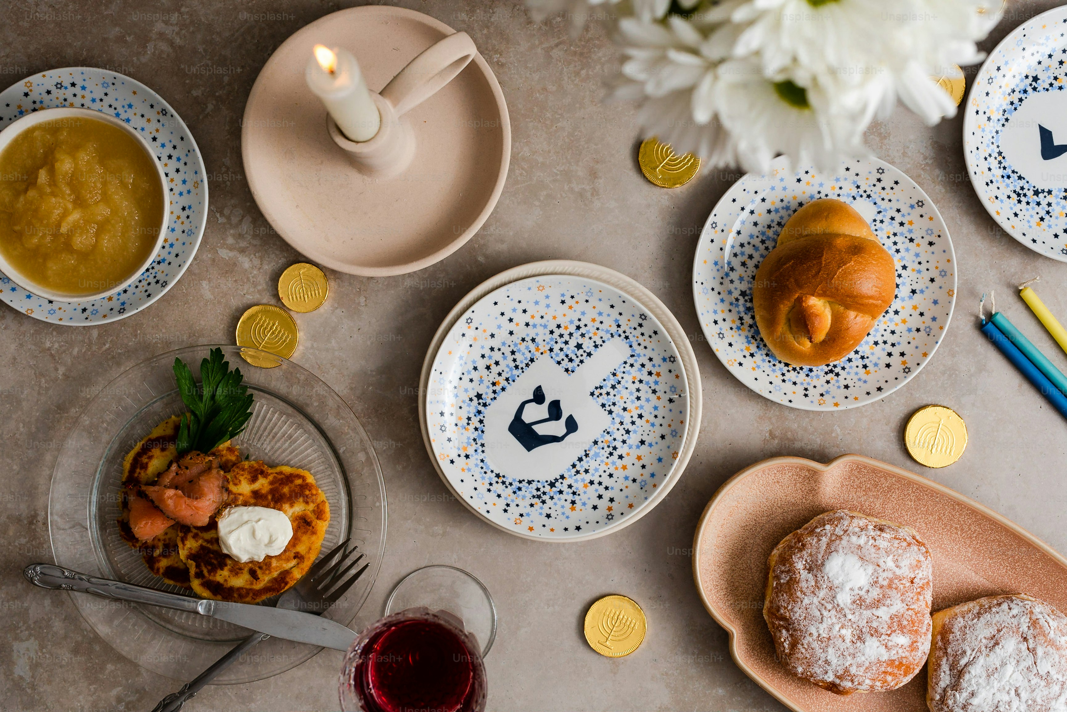 a table topped with plates and bowls filled with food