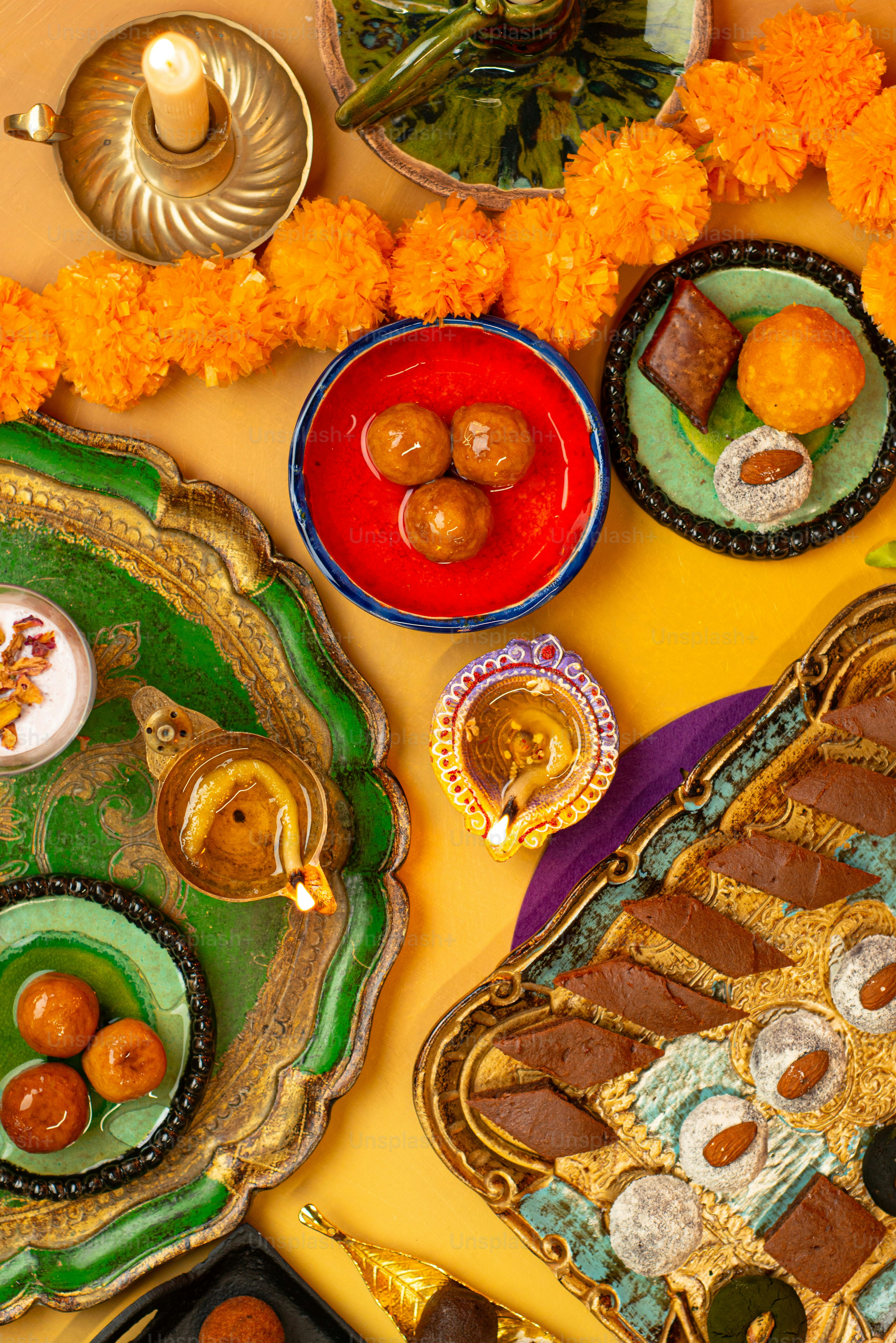 a table topped with plates and bowls filled with food